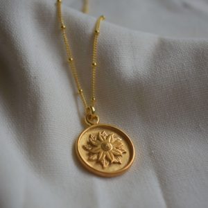 gold plated poinsettia floral pendant necklace